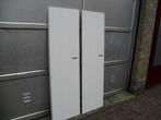 Witte houten kastdeuren, Ophalen