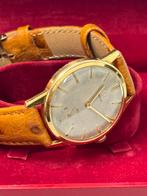 Omega horloge lederen band 18K 1960-1970 33mm kast 23cm tot, Goud, Omega, 1960 of later, Met bandje