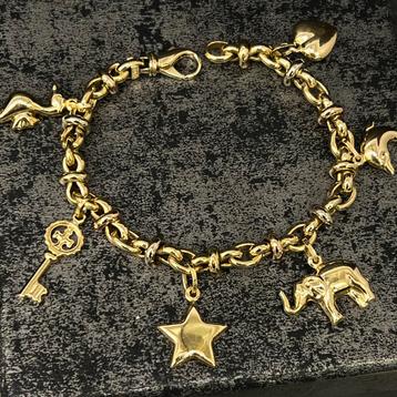 18k gouden bedels armband massief met prachtig bedels beschikbaar voor biedingen