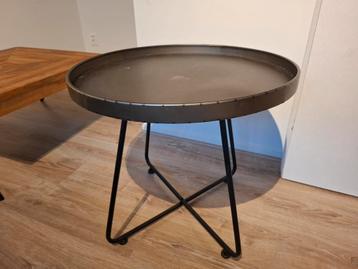 Ronde salontafel groen blad met zwarte poot beschikbaar voor biedingen