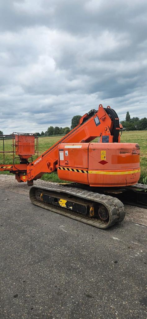 Hitachi HX99B (bj 2010)