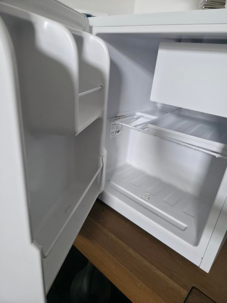 Kleine koelkast met vriesvakje, Ophalen