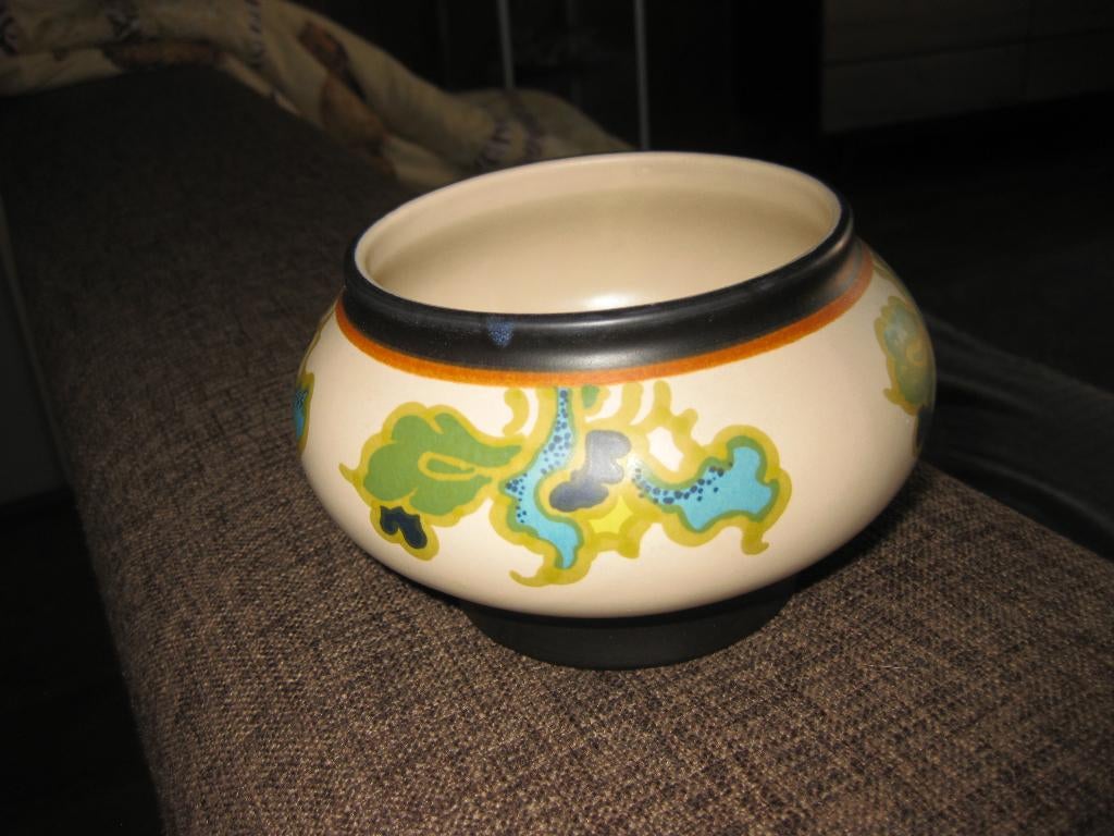Gouds plateel potje, Ophalen