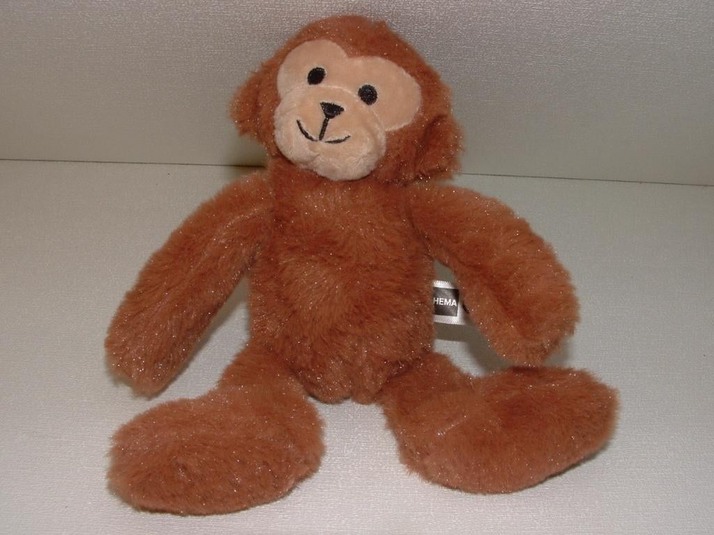 HEMA AAP PLUCHE WOLLIG BRUIN MET VELOURS HUIDSKLEUR, Ophalen of Verzenden, Nieuw, Overige typen