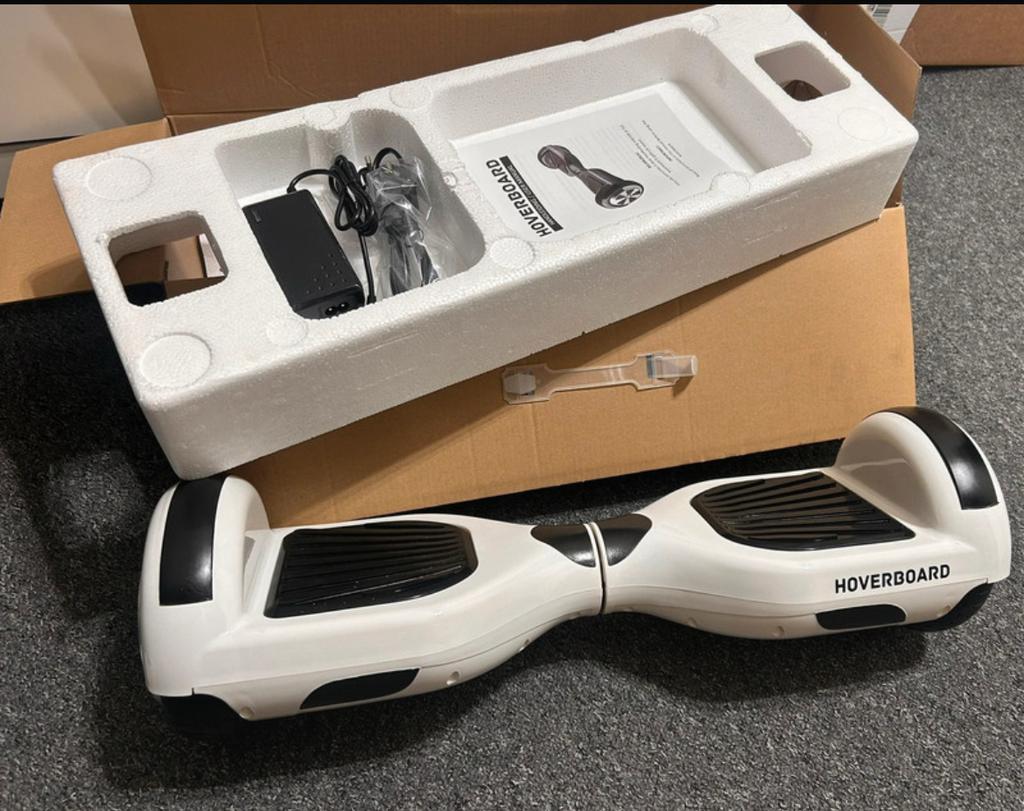 Nieuwe Hoverboard 6,5 inch met oplader en handleiding, Ophalen of Verzenden, Nieuw