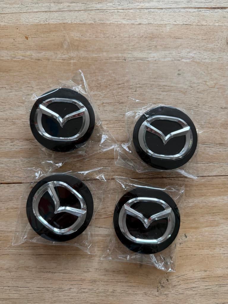 Zwarte mazda naafdoppen, Ophalen of Verzenden, Nieuw