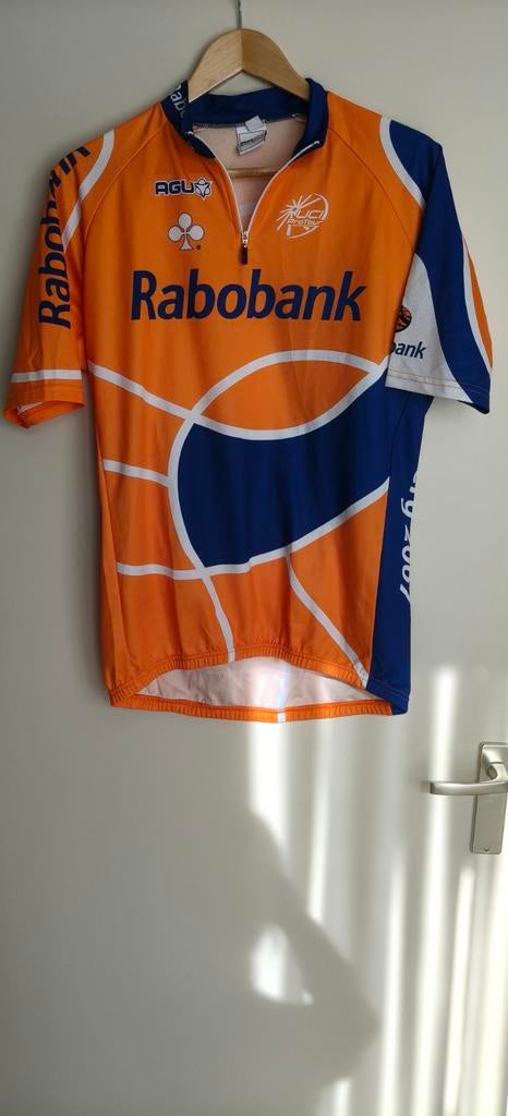 NIEUW AGU Rabobank Wielershirt Maat L - Oranje/Blauw, Fietsen en Brommers, Fietsaccessoires | Fietskleding, Gebruikt, Heren, Ophalen of Verzenden