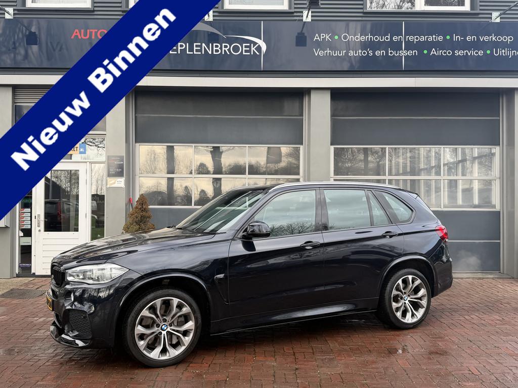 BMW X5 xDrive50i High Executive 7p Dealer onderhouden Bj 201, Auto's, BMW, Automaat, Gebruikt, 7 stoelen, Zwart