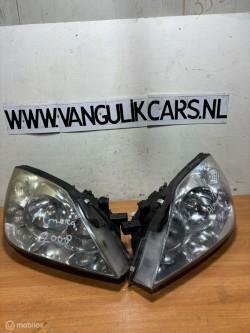 Koplamp set Nissan Primera III ('02-'09), Auto-onderdelen, Verlichting, Nissan, Gebruikt, Ophalen of Verzenden