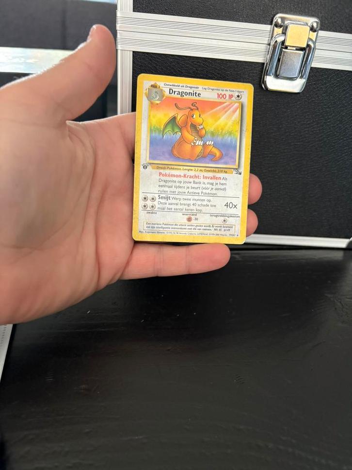 Dragonite 1 st edition, Hobby en Vrije tijd, Verzamelkaartspellen | Pokémon, Zo goed als nieuw, Meerdere kaarten, Foil, Ophalen of Verzenden