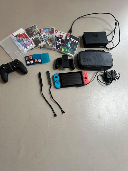 Nintendo switch Lite met 6 games rood blauw., Spelcomputers en Games, Spelcomputers | Nintendo Switch, Zo goed als nieuw, Switch OLED