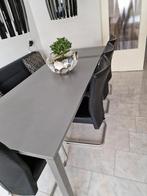 vier stuks lederen eetkamerstoelen, Ophalen, Zwart, Modern met roestvrijstalen onderkant, Zo goed als nieuw