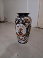 Oosterse vaas met bloemmotief, Ophalen