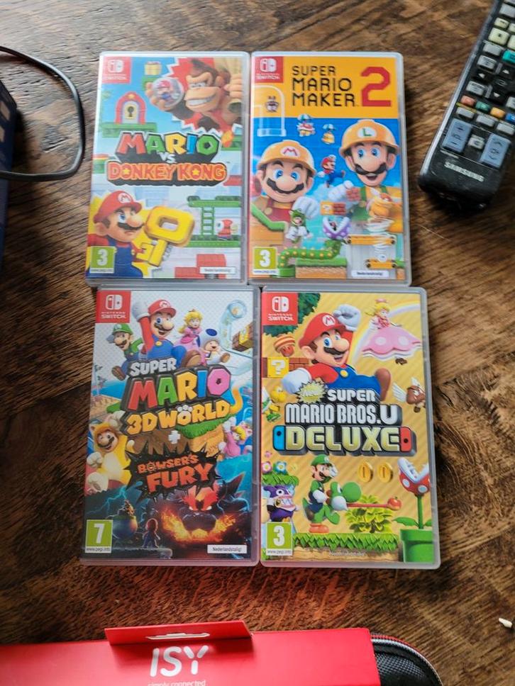 Nintendo Switch OLED + 5 Mario Games!, Spelcomputers en Games, Games | Nintendo Switch, Zo goed als nieuw, Platform, 3 spelers of meer