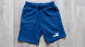 Puma, donkerblauwe sportbroek maat 140. beschikbaar voor biedingen