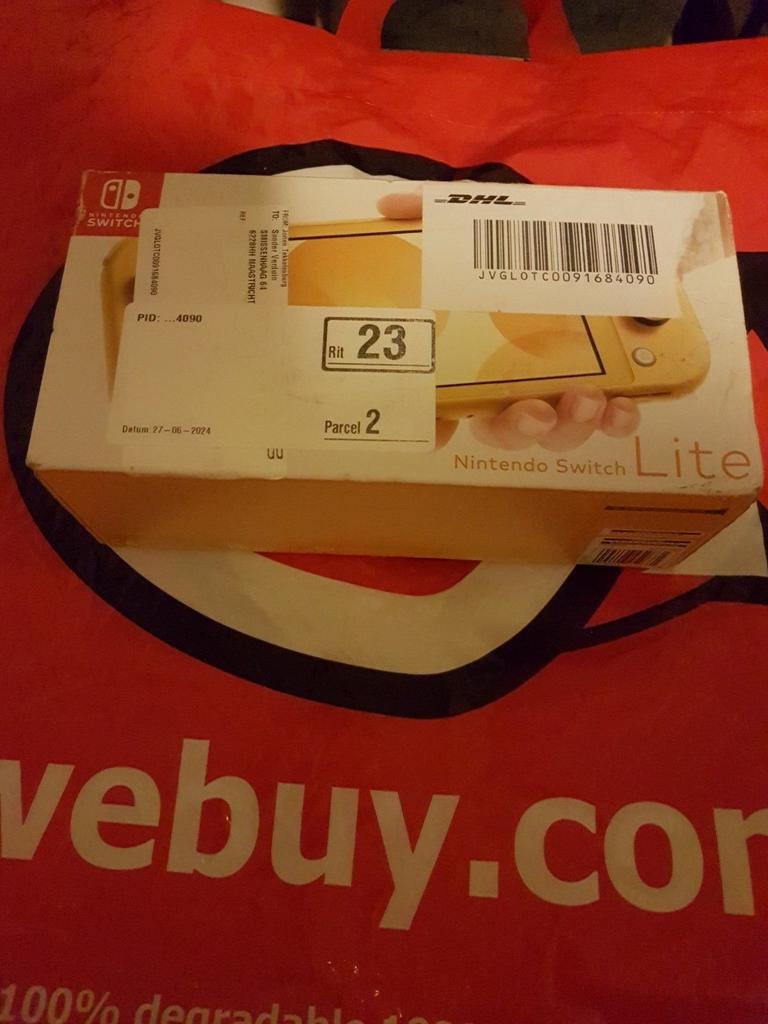 Nintendo Switch Lite - Compleet met Doos & Adapter, Ophalen of Verzenden, Geel, Gebruikt