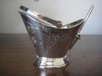 verzilverde suikerpot van D.E., Ophalen