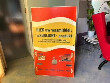 Reclamebord wasserette, deur automaat beschikbaar voor biedingen
