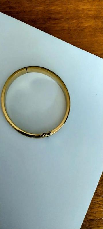 Slaven armband Amerikaans goud gemerkt  beschikbaar voor biedingen