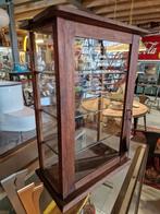 toonbank vitrine, Ophalen