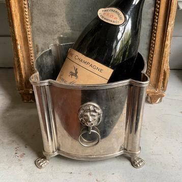 Champagnekoeler 4 leeuwenkoppen nr. 4  *tres jolie Duiven* beschikbaar voor biedingen