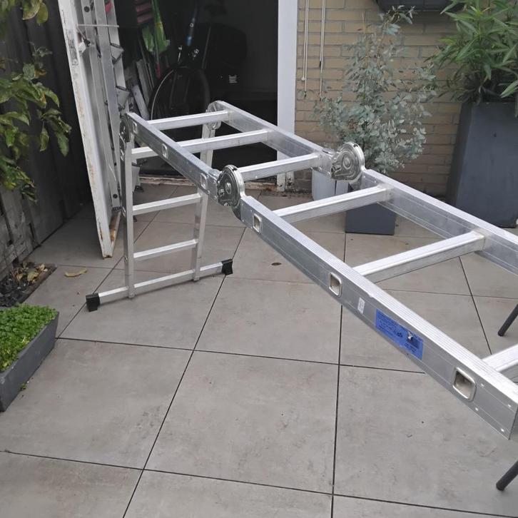 Te koop vouwladder met platen. Div ladders. Alpe 3x11., Doe-het-zelf en Verbouw, Ladders en Trappen, Zo goed als nieuw, Ladder