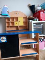 Houten speelgoedwinkel, Ophalen