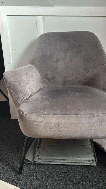 Grijze fauteuil