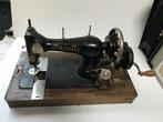 2 naaimachines, Ophalen