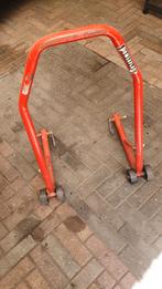 Paddock standaard div motoren, Ophalen