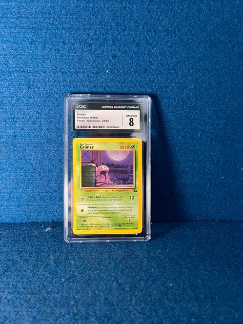 Pokémon TCG slab - Grimer NM/Mint 8 (CGC) - Fossil set, Hobby en Vrije tijd, Verzamelkaartspellen | Pokémon, Zo goed als nieuw