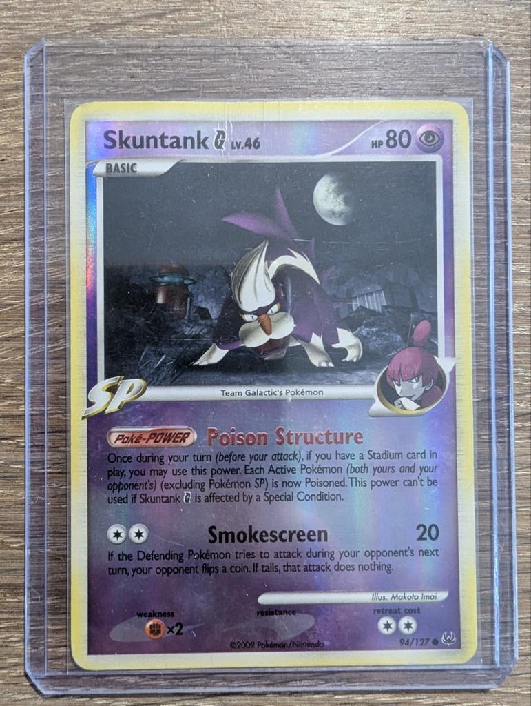 Skuntank G uit Platinum 94/127 Reversed Foil, Ophalen of Verzenden, Zo goed als nieuw, Losse kaart, Foil