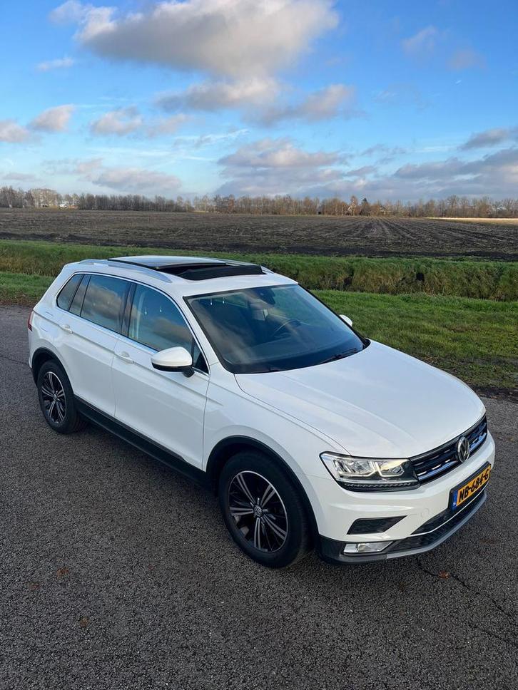 Volkswagen Tiguan 1.4 TSI 110KW/150PK 6DSG M16 2017 Wit, Auto's, Volkswagen, Particulier, Tiguan, Adaptive Cruise Control, Airbags