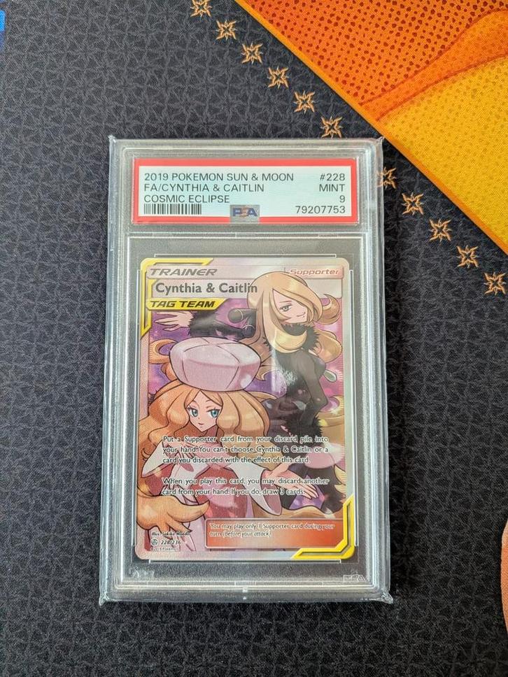 Cynthia & Caitlin Trainer #228 Pokemon Cosmic Eclipse PSA 9, Hobby en Vrije tijd, Verzamelkaartspellen | Pokémon, Zo goed als nieuw