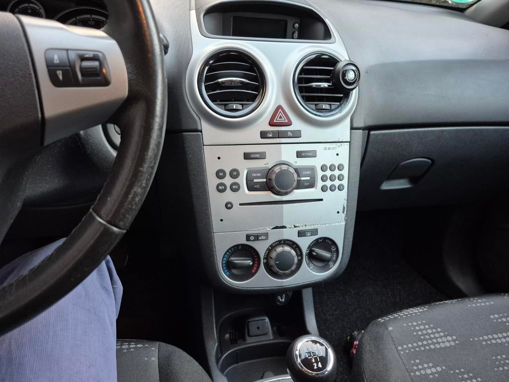 Opel Corsa 1.4 16V 5D 2011 Grijs, Auto's, Voorwielaandrijving, 1063 kg, 1398 cc, 4 cilinders