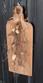 Toef op houten plank, Ophalen