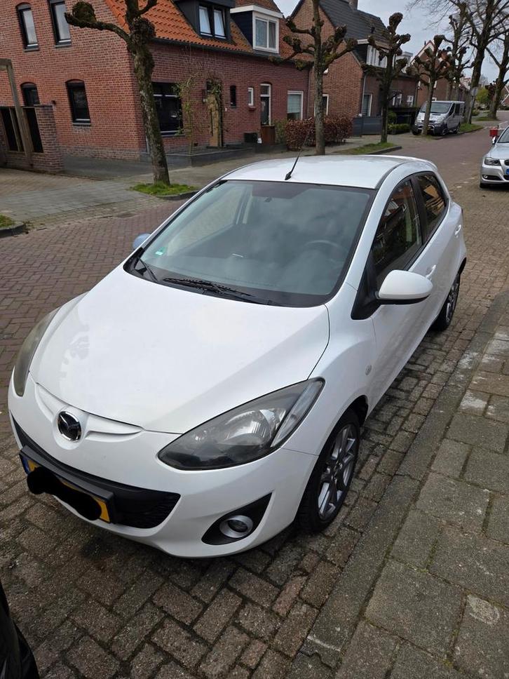 Mazda 2 1.3 62KW 5-DRS 2013 Wit, Auto's, Mazda, Particulier, Airbags, Airconditioning, Bluetooth, Boordcomputer, Centrale vergrendeling