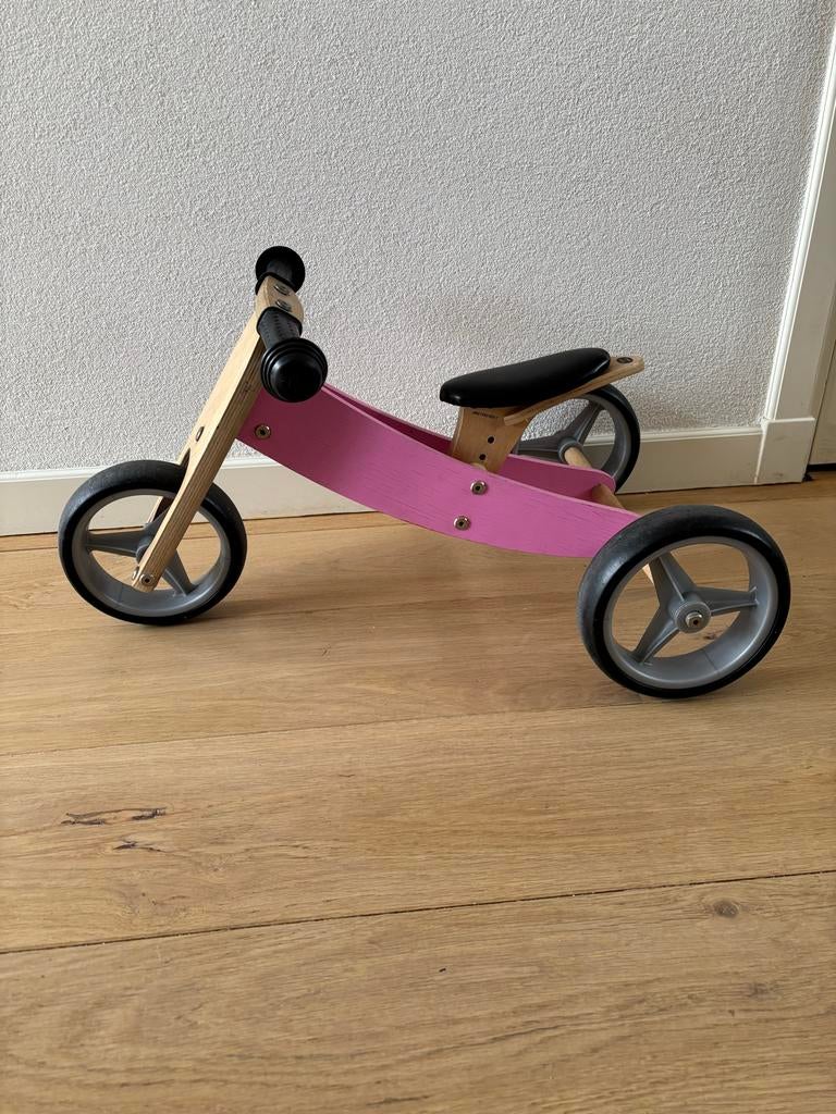 Roze houten loopfiets 4 in 1, Kinderen en Baby's, Speelgoed | Buiten | Voertuigen en Loopfietsen, Ophalen, Gebruikt, Loopfiets