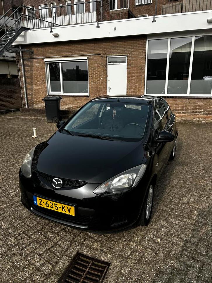 Mazda 2 1.3 63KW 3DRS 2010 Zwart, Auto's, Mazda, Particulier, Benzine, Hatchback, Handgeschakeld, Geïmporteerd, Zwart, Zwart, Stof