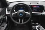 BMW iX1 eDrive20 M Sport / Sportstoelen / Achteruitrijcamera, Auto's, BMW, Zwart, Blauw, Nieuw, 1840 kg