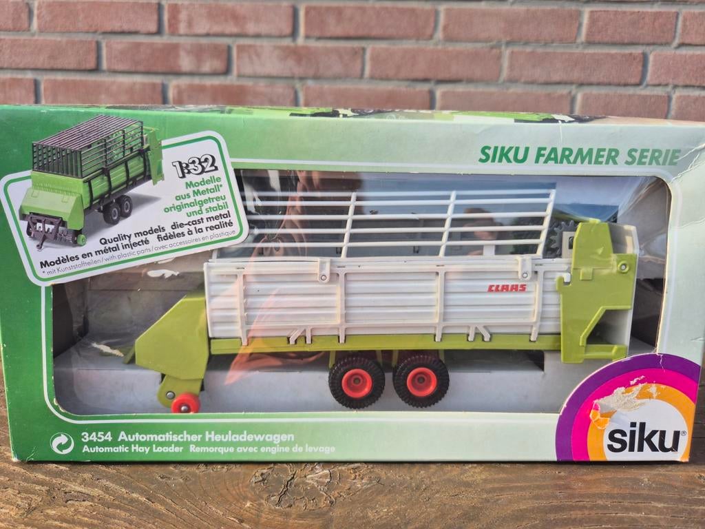 Siku 1:32 Claas opraapwagen, Hobby en Vrije tijd, Ophalen of Verzenden, 1:32 tot 1:50, Overige typen, Overige merken