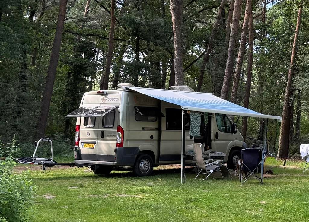 Pössl Buscamper 6.0 meter, breedtebed - weinig KM, Caravans en Kamperen, Campers, Buscamper of Camperbus, Luifel, Ringverwarming