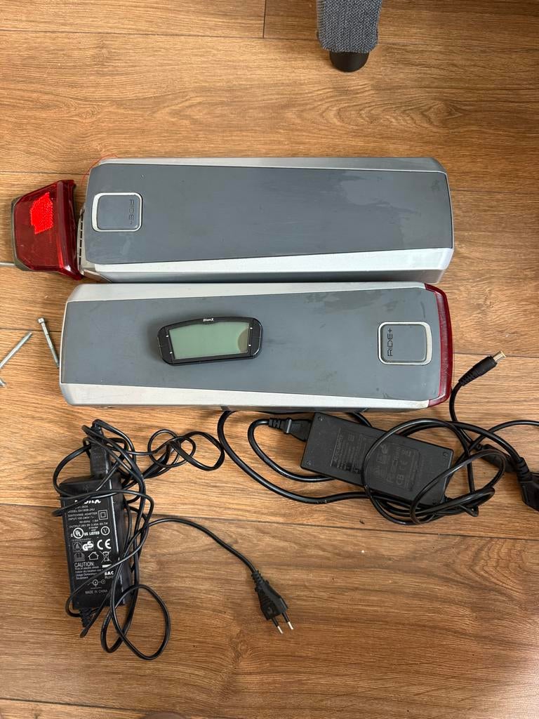 BionX  Trek fietsaccu's en laders en schrem, Ophalen of Verzenden, Gebruikt