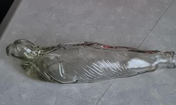 Oude fles in de vorm van een zeehond beschikbaar voor biedingen