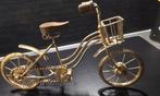 Goudkleurige decoratie fiets, Ophalen