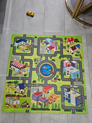 Speel puzzelmat speelkleed mat met een stad thema. Ideaal  beschikbaar voor biedingen