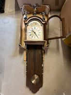 Antieke Friese staartklok, Ophalen