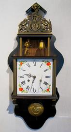 Hangklok Warmink met hamermannetje., Ophalen