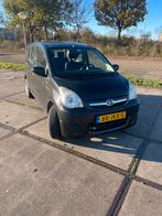Daihatsu Cuore 1.0 5D 2009 Zwart, Auto's, Daihatsu, Voorwielaandrijving, Stof, 600 kg, Zwart