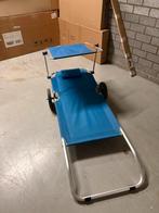 Een opvouwbaar ligbedje met wielen, Ophalen, Gebruikt